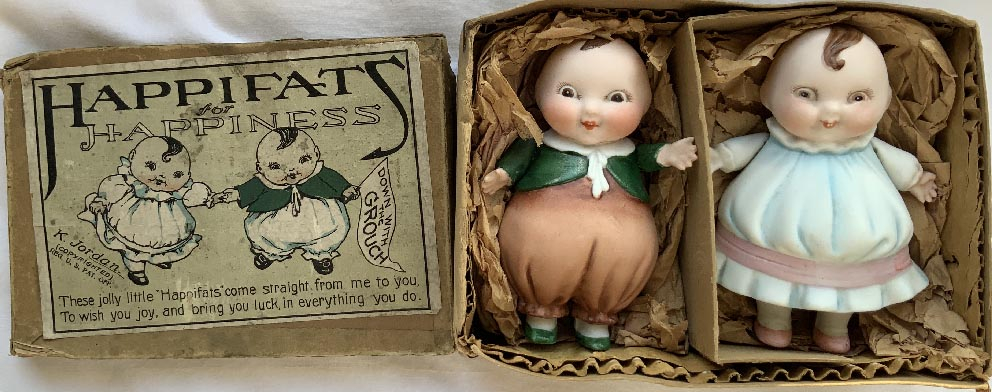 boxed pair of circa 1920 German Porcelain Happifat dolls